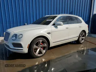 2017 Bentley Bentayga W12 z VIN SJAAC2ZV6HC015698, wystawiony jako Copart lot #44499271 z przebiegiem 35 124 mil mil oraz Tytuł czysty. Historia ofert i sprzedaży dostępna na DreamBid. Obrazek 1.