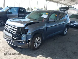 2019 Volkswagen Atlas SE with VIN 1V2DR2CA2KC547116, listed as a IAAI auction lot 41840372 with 102,625 mi miles and . Bid and sale history available at DreamBid. Image 2.