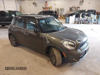 2011 MINI Countryman S z VIN WMWZC3C54BWL78942, wystawiony jako IAAI lot #42345296 z przebiegiem 158 202 mil mil oraz . Historia ofert i sprzedaży dostępna na DreamBid. Obrazek 1.