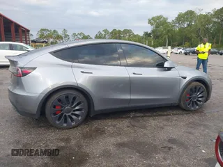 2024 Tesla Model Y Performance with VIN 7SAYGDEF3RA307468, listed as a IAAI auction lot 41805853 with 10,377 mi miles and . Bid and sale history available at DreamBid. Image 12.