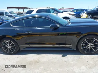 2015 Ford Mustang EcoBoost z VIN 1FA6P8TH6F5382719, wystawiony jako IAAI lot #42316250 z przebiegiem 119 412 mil mil oraz . Historia ofert i sprzedaży dostępna na DreamBid. Obrazek 13.