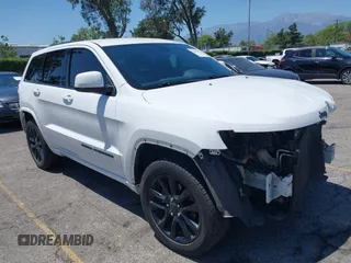 2020 Jeep Grand Cherokee Laredo E with VIN 1C4RJEAG1LC170576, listed as a IAAI auction lot 42283104 with 123,068 mi miles and . Bid and sale history available at DreamBid. Image 1.