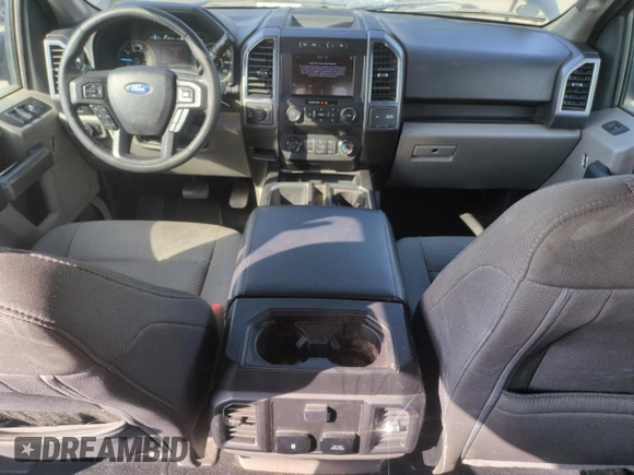 2019 Ford F-150 XL with VIN 1FTEW1E53KFB57102, listed as a Copart auction lot 61633055 with 86,949 mi miles and Salvage title. Bid and sale history available at DreamBid. Image 8.