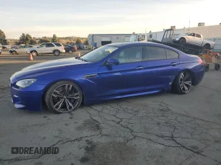 2014 BMW M6 z VIN WBS6C9C5XEDV73722, wystawiony jako Copart lot #87202664 z przebiegiem 68 283 mil mil oraz Szkoda całkowita • Salvage title. Historia ofert i sprzedaży dostępna na DreamBid. Obrazek 1.