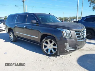 2015 Cadillac Escalade ESV Premium z VIN 1GYS4JKJ8FR218128, wystawiony jako IAAI lot #41248556 z przebiegiem 128 831 mil mil oraz . Historia ofert i sprzedaży dostępna na DreamBid. Obrazek 1.