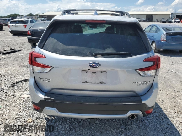 2021 Subaru Forester Touring with VIN JF2SKAXCXMH458971, listed as a Copart auction lot 64107045 with 59,672 mi miles and Salvage title. Bid and sale history available at DreamBid. Image 6.