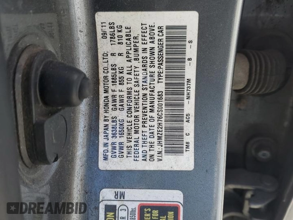 2012 Honda Insight EX z VIN JHMZE2H76CS001683, wystawiony jako Copart lot #49061885 z przebiegiem 259 158 mil mil oraz Szkoda całkowita • Salvage title. Historia ofert i sprzedaży dostępna na DreamBid. Obrazek 12.