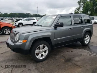 2014 Jeep Patriot Latitude with VIN 1C4NJRFB7ED501578, listed as a Copart auction lot 63308005 with 76,100 mi miles and Salvage title. Bid and sale history available at DreamBid. Image 1.