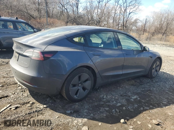 2022 Tesla Model 3 Long Range with VIN 5YJ3E1EB7NF257549, listed as a Copart auction lot 46980555 with 68,955 mi miles and Salvage Title. Bid and sale history available at DreamBid. Image 3.