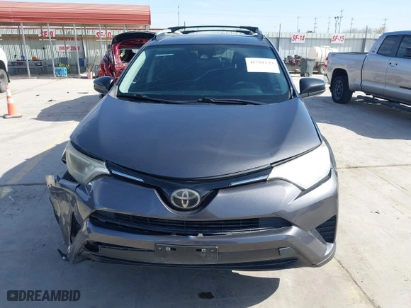 2018 Toyota RAV4 LE with VIN 2T3ZFREV4JW412661, listed as a IAAI auction lot 41781229 with 140,131 mi miles. Bid and sale history available at carsss.com. Image 12.
