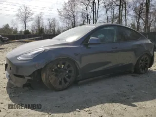 2022 Tesla Model Y Long Range with VIN 7SAYGDEE5NF366493, listed as a Copart auction lot 49874975 with 66,925 mi miles and Salvage Title. Bid and sale history available at DreamBid. Image 1.