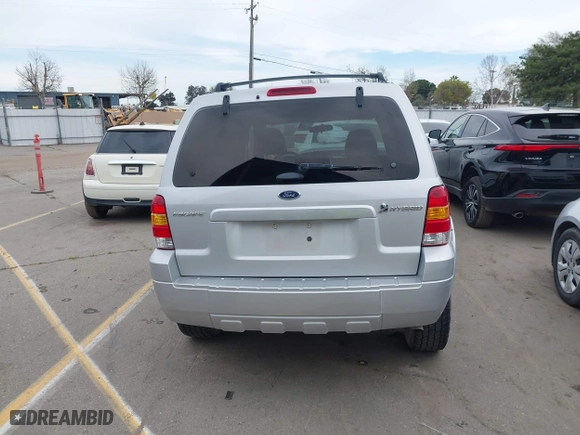 2005 Ford Escape Hybrid with VIN 1FMCU95H05KC95225, listed as a IAAI auction lot 41798610 with 216,659 mi miles. Bid and sale history available at carsss.com. Image 16.