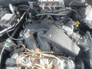 2006 Ford Escape XLT with VIN 1FMYU93126KC04632, listed as a IAAI auction lot 41912068 with 133,216 mi miles. Bid and sale history available at carsss.com. Image 12.