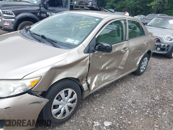 2010 Toyota Corolla z VIN 2T1BU4EE7AC242669, wystawiony jako IAAI lot #42743042 z przebiegiem 91 061 mil mil oraz . Historia ofert i sprzedaży dostępna na DreamBid. Obrazek 6.