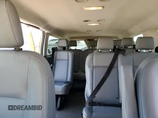 2019 Ford Transit Passenger XL z VIN 1FMZK1ZM0KKA09894, wystawiony jako Copart lot #61650455 z przebiegiem 100 779 mil mil oraz Szkoda całkowita • Salvage title. Historia ofert i sprzedaży dostępna na DreamBid. Obrazek 10.