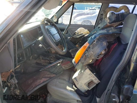 1995 Jeep Cherokee Sport с VIN 1J4FJ68S5SL657646, выставлен на аукционе Copart как лот 82431114 с пробегом 211 538 миль миль и На запчасти • Non repairable. История ставок и продаж доступна на DreamBid. Изображение 7.