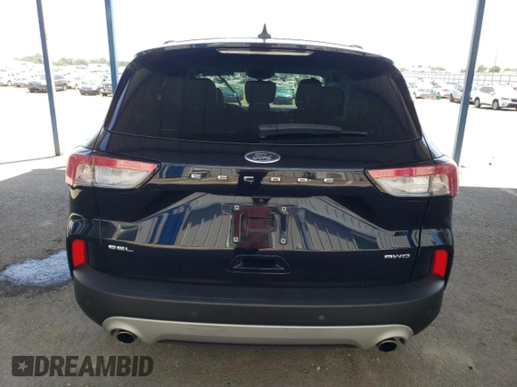 2021 Ford Escape SEL with VIN 1FMCU9H65MUA70490, listed as a Copart auction lot 57815275 with 62,227 mi miles and Salvage title. Bid and sale history available at DreamBid. Image 6.