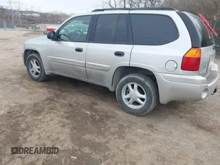 2004 GMC Envoy SLE with VIN 1GKDT13S142219365, listed as a IAAI auction lot 41612594 with 72,292 mi miles. Bid and sale history available at carsss.com. Image 3.