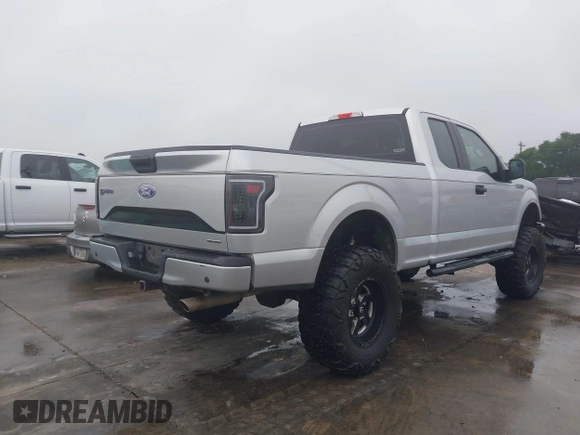2015 Ford F-150 XL with VIN 1FTEX1C86FKE20397, listed as a IAAI auction lot 42203979 with 101,695 mi miles and . Bid and sale history available at DreamBid. Image 4.