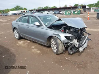 2014 Audi A6 Premium Plus z VIN WAUGFAFCXEN102580, wystawiony jako IAAI lot #42367625 z przebiegiem Nie podano mil oraz . Historia ofert i sprzedaży dostępna na DreamBid. Obrazek 1.