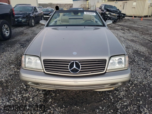 1999 Mercedes-Benz SL-Class with VIN WDBFA68F8XF178084, listed as a Copart auction lot 82295024 with 123,008 mi miles and Salvage Title. Bid and sale history available at carsss.com. Image 5.