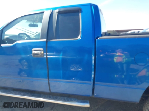 2014 Ford F-150 XL with VIN 1FTFX1EF2EFC25761, listed as a IAAI auction lot 41610999 with 265,989 mi miles. Bid and sale history available at carsss.com. Image 15.