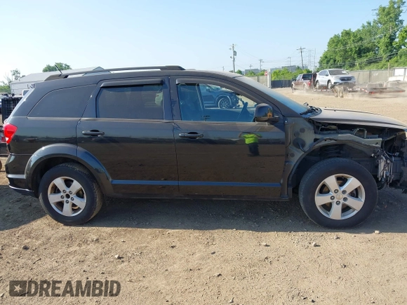 2012 Dodge Journey SXT z VIN 3C4PDCBG0CT290763, wystawiony jako IAAI lot #42553350 z przebiegiem 152 943 mil mil oraz . Historia ofert i sprzedaży dostępna na DreamBid. Obrazek 13.