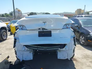 2023 Tesla Model Y Long Range with VIN 7SAYGDEE1PF660444, listed as a IAAI auction lot 42065046 with 23,601 mi miles and . Bid and sale history available at DreamBid. Image 17.