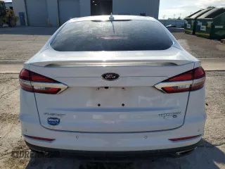 2020 Ford Fusion Titanium with VIN 3FA6P0D98LR176335, listed as a Copart auction lot 55323275 with 76,572 mi miles and Salvage title. Bid and sale history available at DreamBid. Image 6.