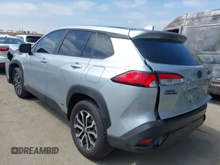 2023 Toyota Corolla Cross Hybrid S with VIN 7MUFBABG1PV014992, listed as a IAAI auction lot 42202656 with 18,913 mi miles and . Bid and sale history available at DreamBid. Image 3.