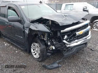 2018 Chevrolet Silverado 1500 LT with VIN 2GCVKREC6J1102304, listed as a IAAI auction lot 41800456 with 82,000 mi miles and . Bid and sale history available at DreamBid. Image 6.