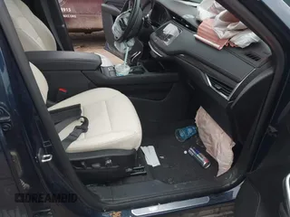 2020 Cadillac XT4 AWD Sport with VIN 1GYFZFR48LF101467, listed as a IAAI auction lot 41113381 with 72,841 mi miles and . Bid and sale history available at DreamBid. Image 5.