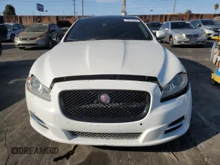 2014 Jaguar XJ with VIN SAJWA2GZ9E8V71794, listed as a Copart auction lot 74347574 with 106,172 mi miles and Clean Title. Bid and sale history available at carsss.com. Image 5.