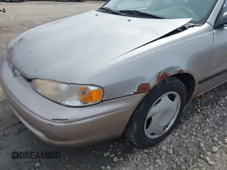1999 Chevrolet Prizm z VIN 1Y1SK5488XZ446950, wystawiony jako IAAI lot #41798129 z przebiegiem 292 798 mil mil oraz . Historia ofert i sprzedaży dostępna na DreamBid. Obrazek 6.