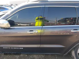 2014 Jeep Grand Cherokee Limited with VIN 1C4RJEBGXEC499052, listed as a IAAI auction lot 41665838 with 160,473 mi miles. Bid and sale history available at carsss.com. Image 14.