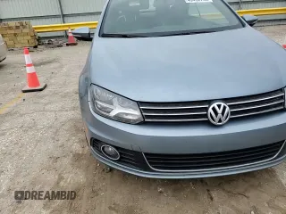 2013 Volkswagen Eos Komfort с VIN WVWBW8AH4DV001042, выставлен на аукционе Copart как лот 49492745 с пробегом 119 825 миль миль и Списание • Salvage title. История ставок и продаж доступна на DreamBid. Изображение 10.
