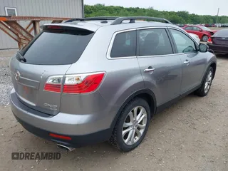 2012 Mazda CX-9 Grand Touring z VIN JM3TB3DA0C0337713, wystawiony jako IAAI lot #42368488 z przebiegiem 184 220 mil mil oraz . Historia ofert i sprzedaży dostępna na DreamBid. Obrazek 4.