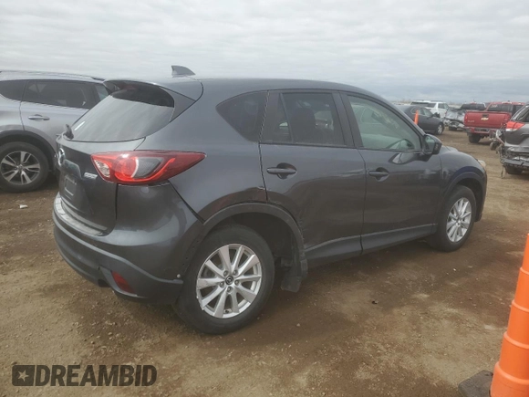 2014 Mazda CX-5 Touring with VIN JM3KE2CYXE0357272, listed as a Copart auction lot 52587565 with 139,937 mi miles and Clean Title. Bid and sale history available at carsss.com. Image 3.