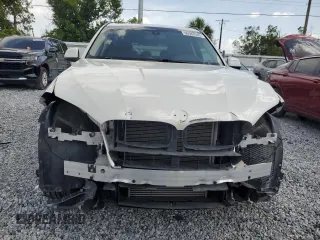 2015 BMW X5 xDrive35i z VIN 5UXKR0C58F0P03231, wystawiony jako Copart lot #60964305 z przebiegiem 71 419 mil mil oraz Szkoda całkowita • Salvage title. Historia ofert i sprzedaży dostępna na DreamBid. Obrazek 5.