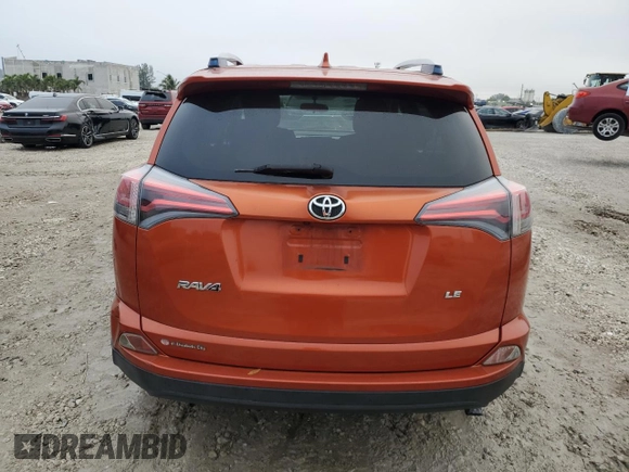 2016 Toyota RAV4 LE with VIN JTMZFREV9GD091819, listed as a Copart auction lot 41958845 with 192,821 mi miles and Salvage Title. Bid and sale history available at carsss.com. Image 6.