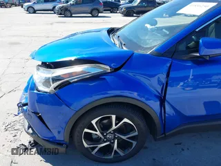2018 Toyota C-HR XLE with VIN JTNKHMBXXJ1004583, listed as a IAAI auction lot 41836250 with 119,858 mi miles and . Bid and sale history available at DreamBid. Image 6.