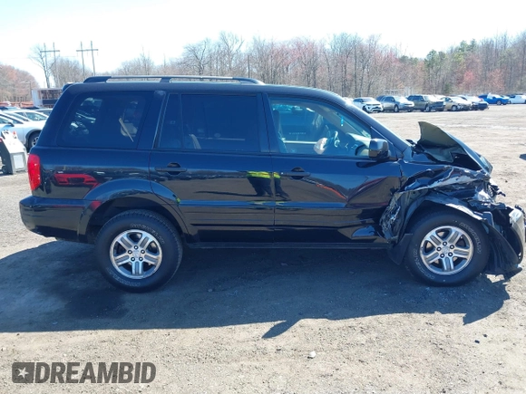 2005 Honda Pilot EX-L with VIN 5FNYF18555B043104, listed as a IAAI auction lot 41888235 with 127,781 mi miles. Bid and sale history available at carsss.com. Image 13.