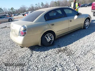 2002 Nissan Altima S with VIN 1N4AL11D92C287784, listed as a IAAI auction lot 41671404 with 131,942 mi miles. Bid and sale history available at carsss.com. Image 4.