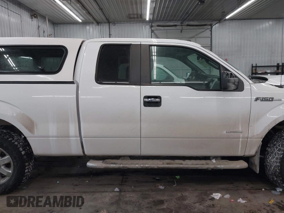 2014 Ford F-150 XL with VIN 1FTFX1ET9EFA62502, listed as a IAAI auction lot 41575300 with 123,698 mi miles and . Bid and sale history available at DreamBid. Image 13.