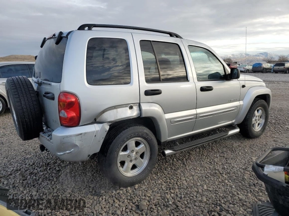 2004 Jeep Liberty Limited with VIN 1J4GK58K04W324655, listed as a Copart auction lot 84969204 with 151,994 mi miles and Salvage title. Bid and sale history available at DreamBid. Image 3.