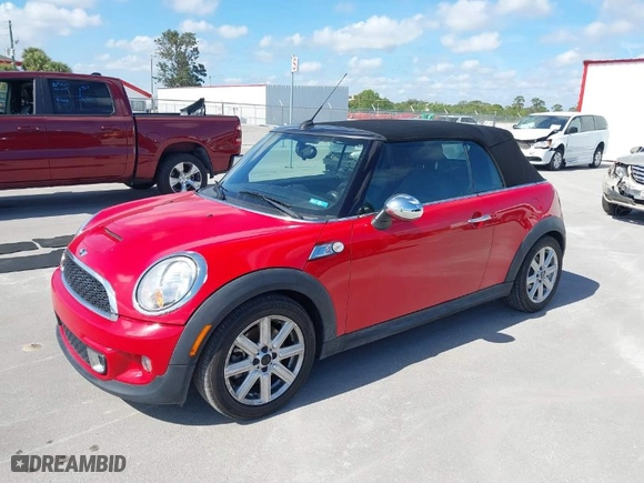 2011 MINI Cooper Convertible s with VIN WMWZP3C55BT249405, listed as a IAAI auction lot 41461640 with 59,856 mi miles. Bid and sale history available at carsss.com. Image 2.