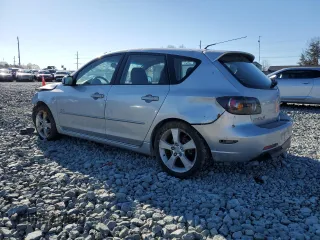 2005 Mazda 3 s with VIN JM1BK143051292702, listed as a Copart auction lot 50704945 with 250,503 mi miles and Salvage Title. Bid and sale history available at carsss.com. Image 2.