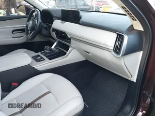 2024 Mazda CX-90 S Premium z VIN JM3KKDHC2R1101502, wystawiony jako IAAI lot #42114075 z przebiegiem 16 288 mil mil oraz . Historia ofert i sprzedaży dostępna na DreamBid. Obrazek 5.