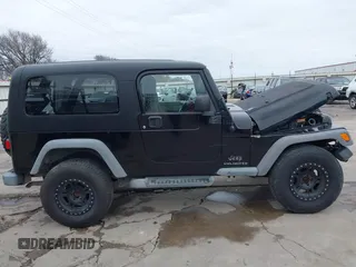 2004 Jeep Wrangler Sport with VIN 1J4FA49S64P794559, listed as a IAAI auction lot 41644201 with 107,445 mi miles. Bid and sale history available at carsss.com. Image 14.