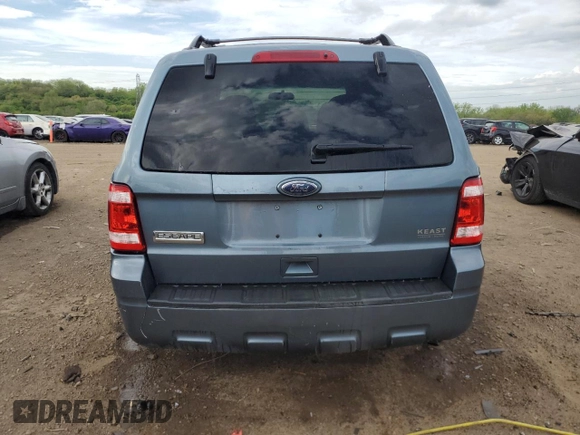 2010 Ford Escape XLS с VIN 1FMCU0C7XAKC29104, выставлен на аукционе Copart как лот 56395805 с пробегом 198 937 миль миль и Списание • Salvage title. История ставок и продаж доступна на DreamBid. Изображение 6.